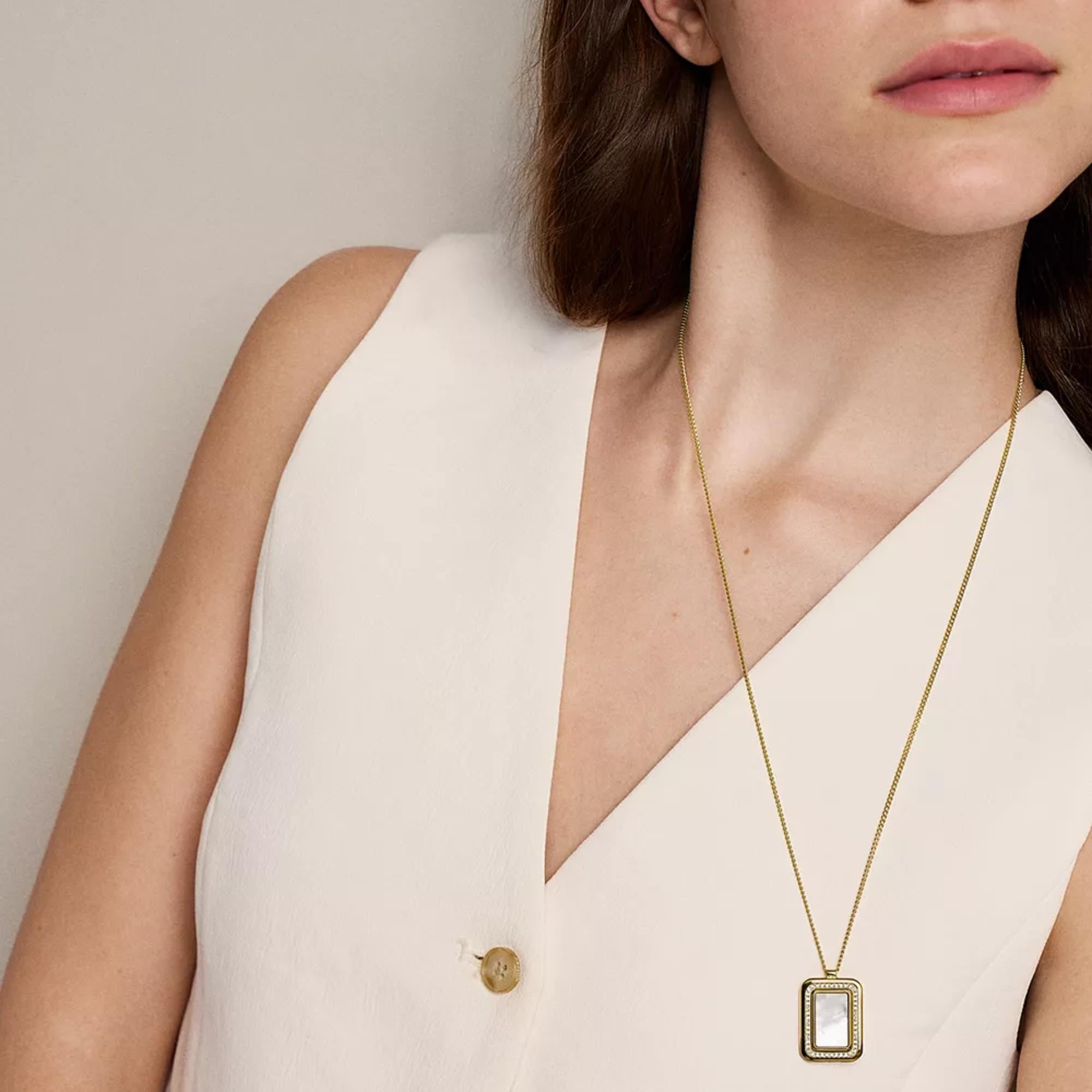 Fossil Raquel Glitz White Mother of Pearl Spinning Pendant Ladies Necklace JF04996710