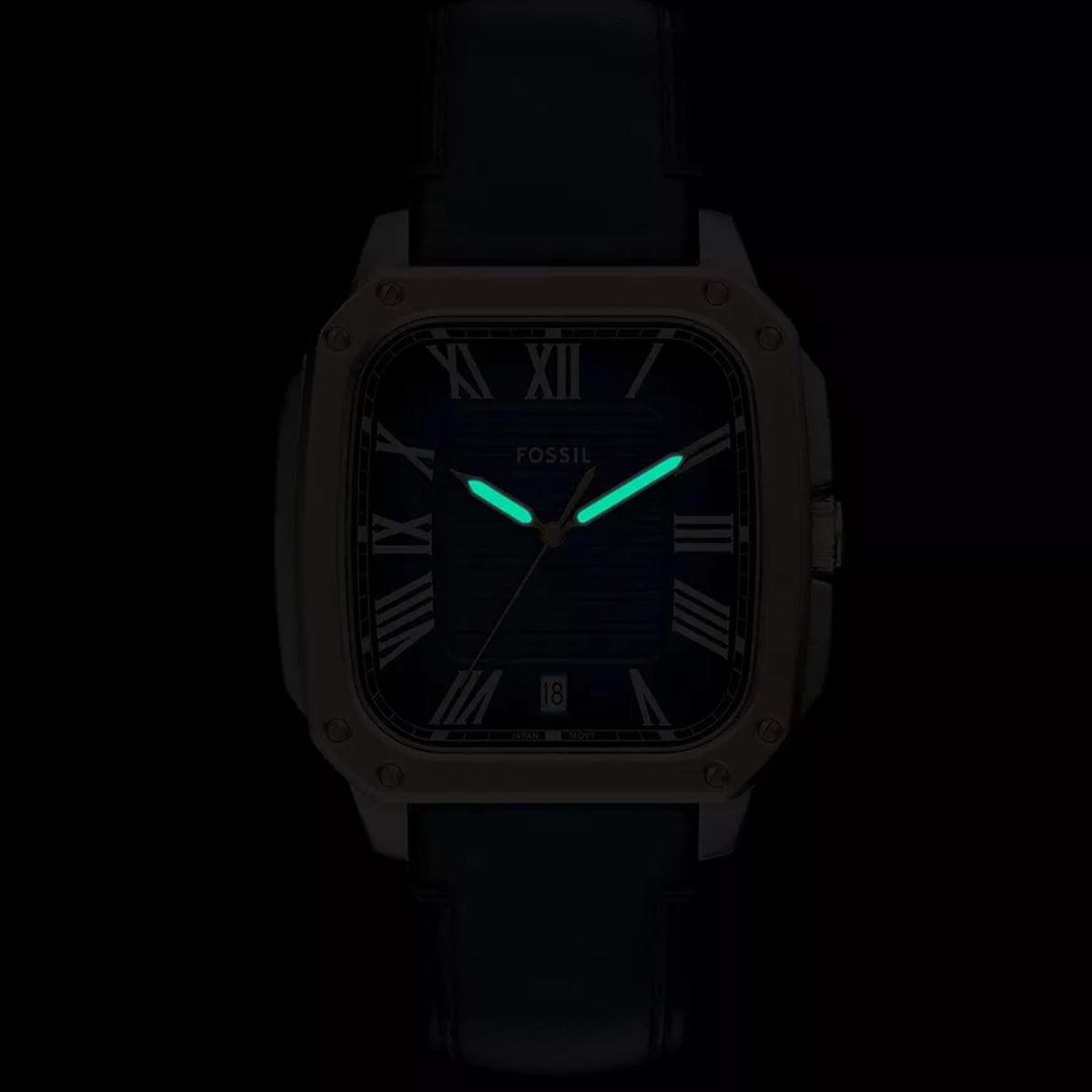 Fossil Crosby FS6149 dark view displaying luminous hands glowing on blue dial