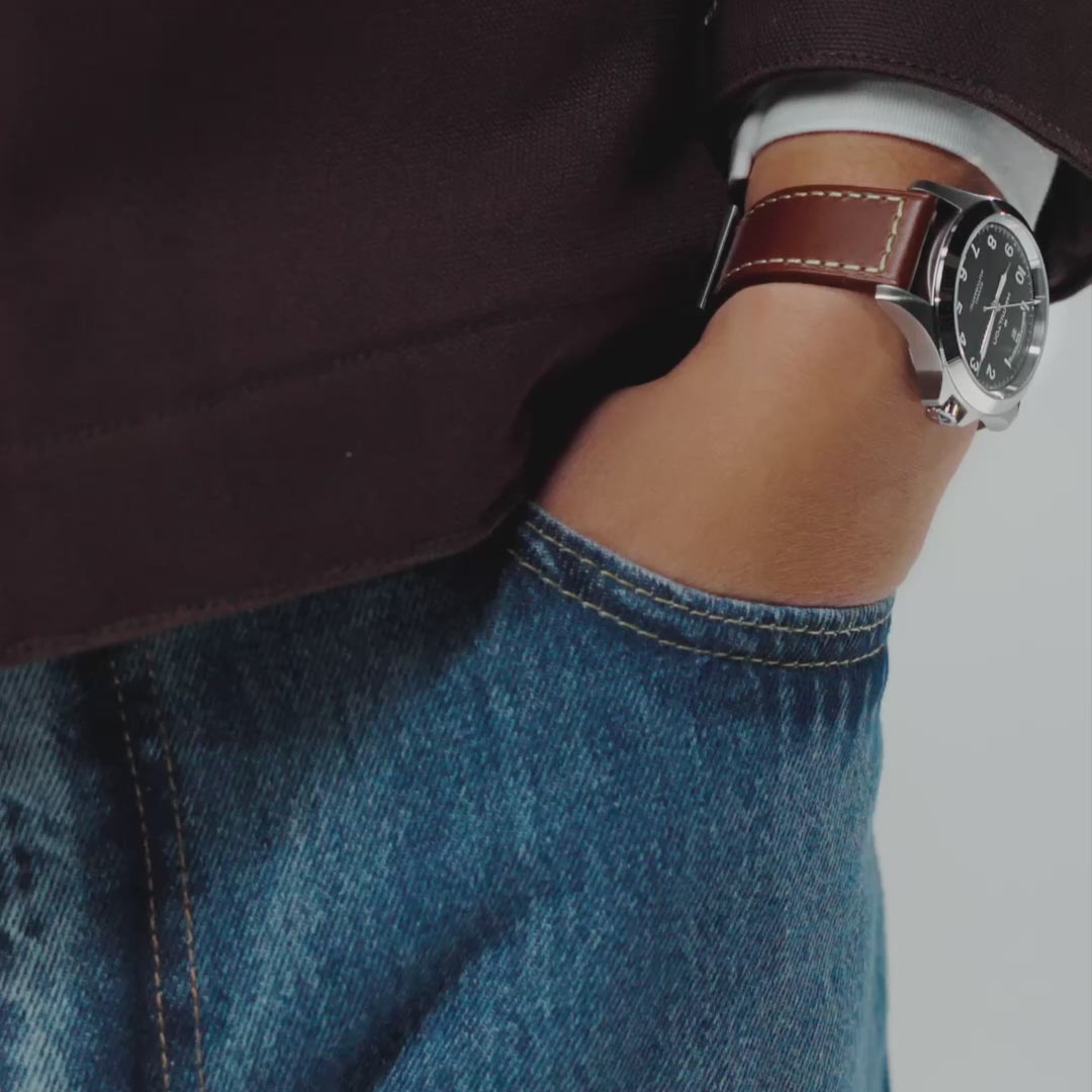 Hamilton Khaki Field King black dial leather day date watch worn on wrist H64475531
