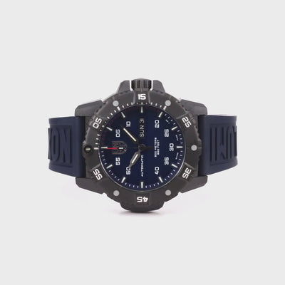 Luminox Master Carbon SEAL XS.3863 automatic timepiece overhead view highlighting the blue dial, black rotating bezel, and matching blue rubber strap