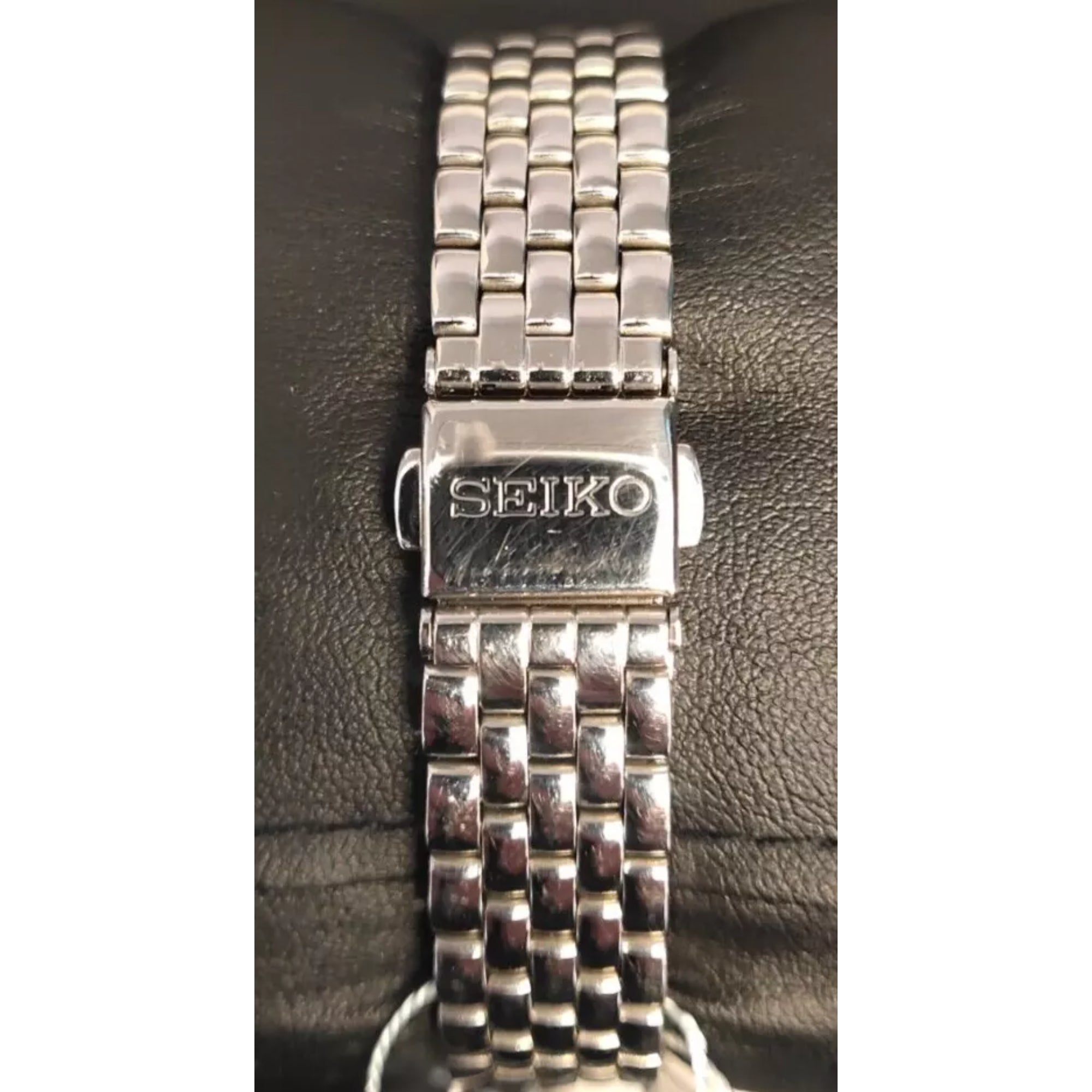 Seiko Ladies Dress Watch Silver Dial Steel Bracelet Jewelled Bezel SUR695P1