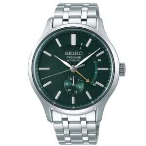 Seiko Presage Zen Garden Silver Stainless Steel Green Dial Automatic Men's Watch SSA397J1 42mmThis Seiko Presage Zen Garden Silver Stainless Steel Green Dial Automatic Men's Watch SSA397J1 42mm allows you to step into serenity. This timepiece is inspired by beautiful Japanese gardens, with a dial in a calming white delicately pressed pattern. The marbled pattern is also seen on the index surfaces, reminiscent of stepping stones across soothing green moss. A golden hand in the shape of an arrow is used to indicate the power reserve of the timepiece, which can reach a maximum of 41 hours. At the 6 o'clock position is a subdial which is used to display the date of the month. Protecting the dial is a silver stainless case as well as sapphire crystal glass. Finally, a silver stainless steel bracelet can be fastened using a folding clasp.This watch has a water resistance of 30 metres, making it suitable for light splashes.For all you Seiko enthusiasts, this premium timepiece has been made and produced in Japan, indicated by the suffix 'J'. Seiko watches made in Japan are notoriously hard to obtain outside of Japan due to the highest quality of craftmanship and astonishing features that come in each individual timepiece. We have a range of Japanese watches here at Watchnation but in limited quantities, so if you are looking to add to your collection then this is the perfect place for you.Key Features:Presage FamilyZen Garden SeriesSilver Stainless Steel CaseSilver Stainless Steel BraceletGreen DialAutomatic MovementPower ReserveMarble Pattern Dial30m Water ResistantSapphire Crystal GlassExhibition Case BackFolding Clasp4R57 Caliber Engine29 Jewels41 Hour Power ReserveDate WindowThe Brand: SeikoSeiko’s 135-year history has been marked by a ceaseless determination to innovate in every aspect of the watchmaker’s art. By embracing this mantra, Seiko has been responsible for a string of industry-leading advances in the technology of time, such as the world’s first quartz watch, the world’s first TV watch, and the Seiko Kinetic, the first watch ever to generate its own electricity from the movement of the wearer. Seiko are unique in that they manufacture every aspect of every watch in-house, with this ruthless pursuit of perfection even including growing their own quartz crystals and sapphires.